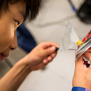 student studying a project